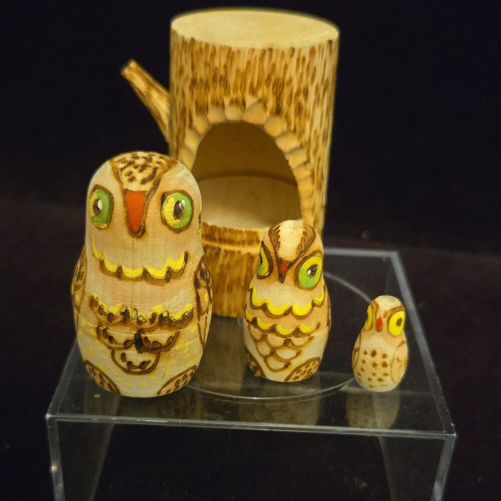 Wood Nesting owls in tree